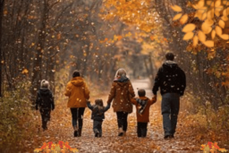 Family walking together on a fall path